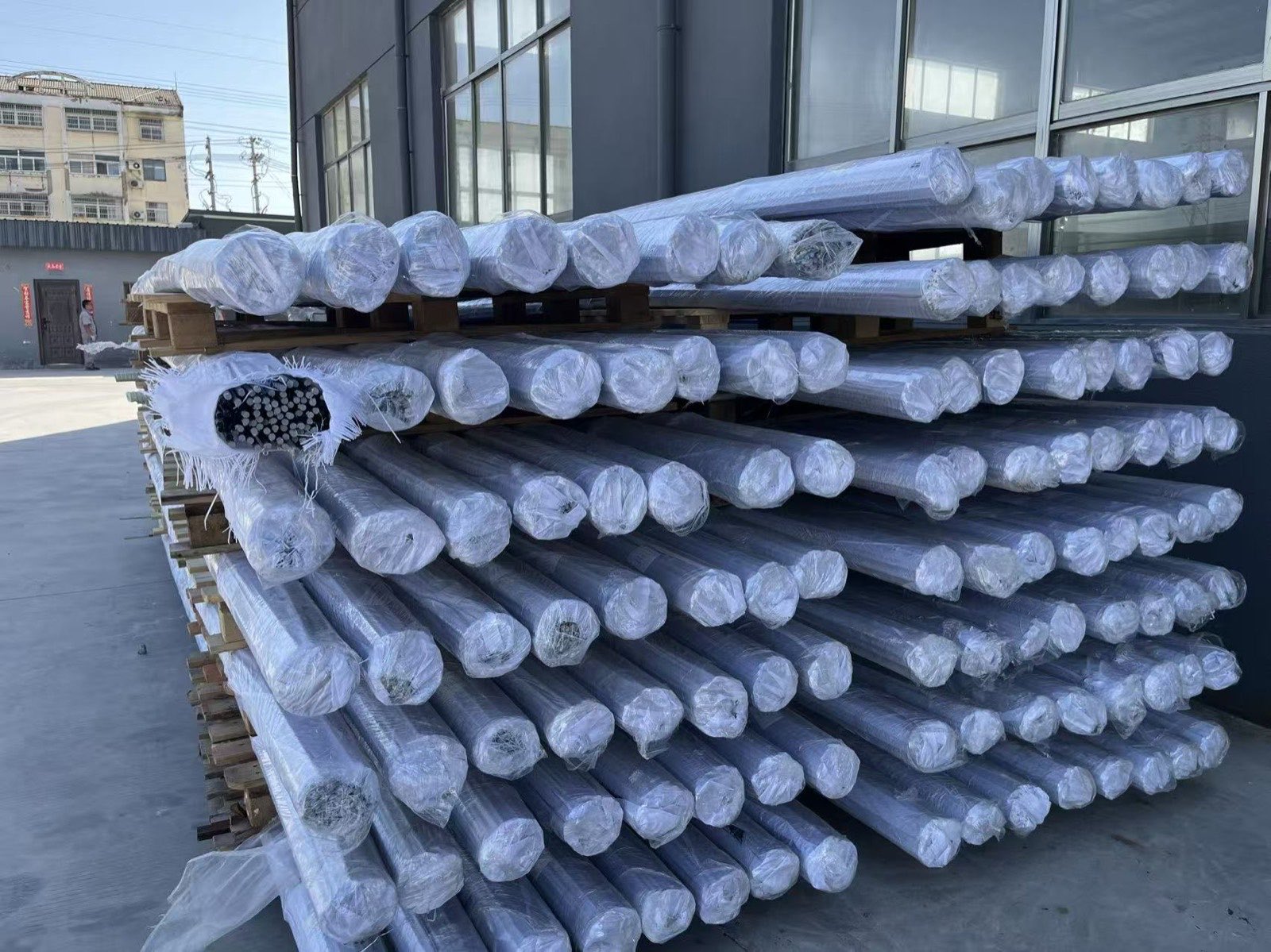 Stacked GFRP rebar bundles ready for shipment